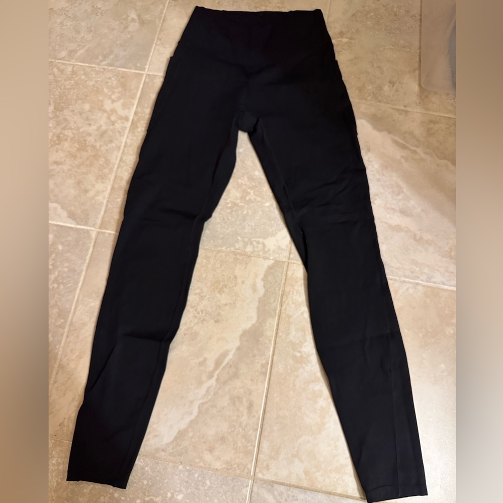 Black halara leggings with pockets. Size small never worn